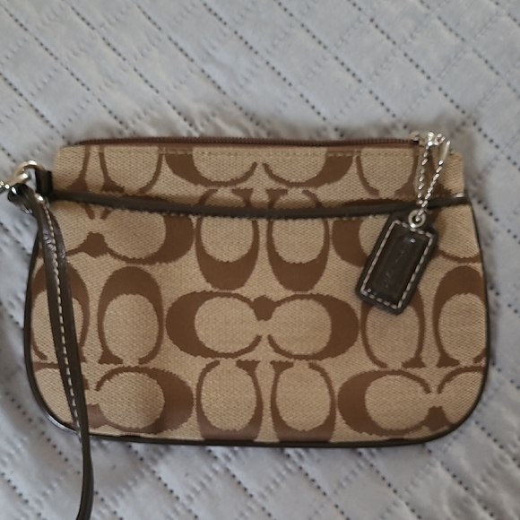 Coach Handbags - Coach Beige and Brown Signature Canvas Wristlet